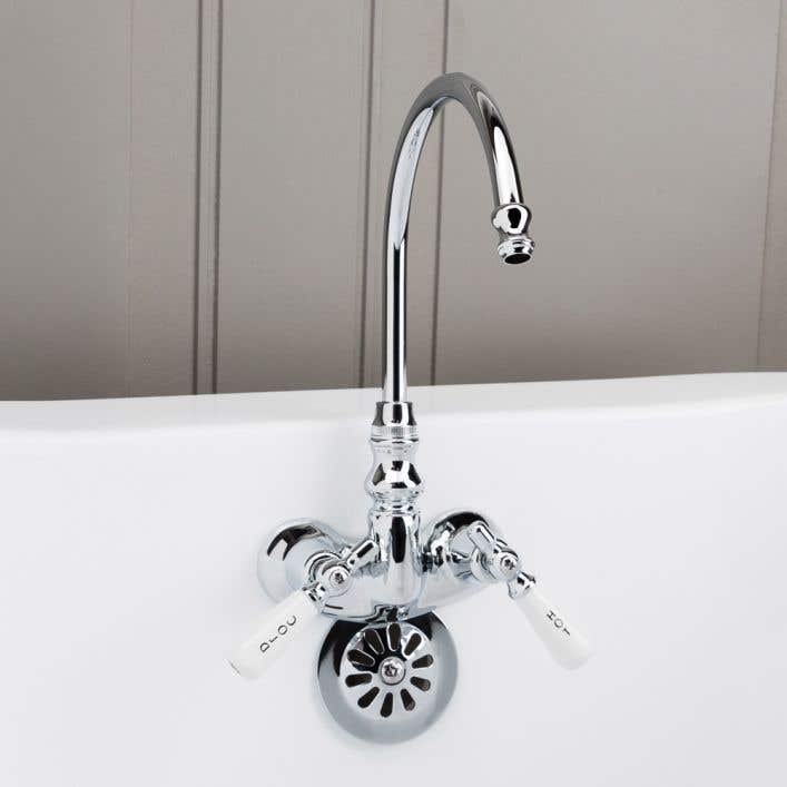 gooseneck clawfoot tub faucet with porcelain lever handles chrome